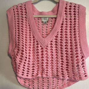 BDG pink hole sweater vest from Urban Outfitters